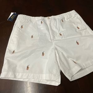 NWT. MENS POLO SHORTS, POLO STRETCH CLASSIC FIT- WHITE WITH MONOGRAM POLO GUY